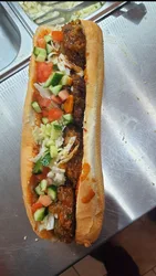 בגט מפרום טוניסאי (מחשי) מבשר בקר עם רוטב